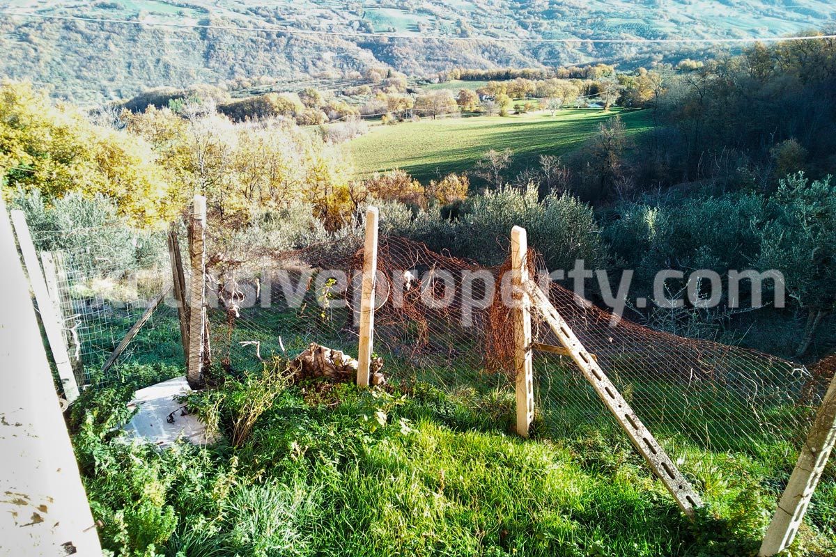 Brick farmhouse surrounded by nature with well for sale in Italy 22