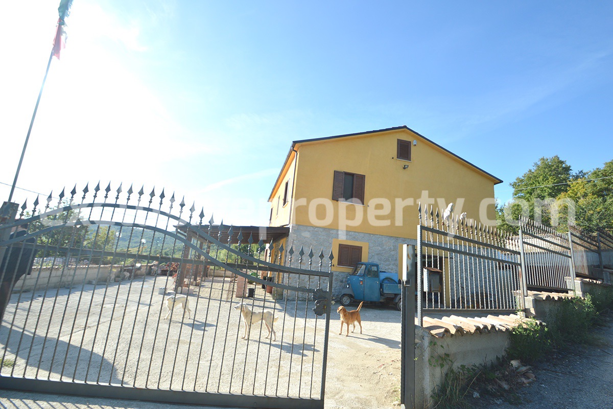 Detached country house with land and wooden veranda for sale in Italy 33