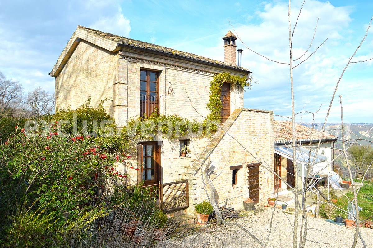 Typical country house back on the green hills near the Adriatic sea 1