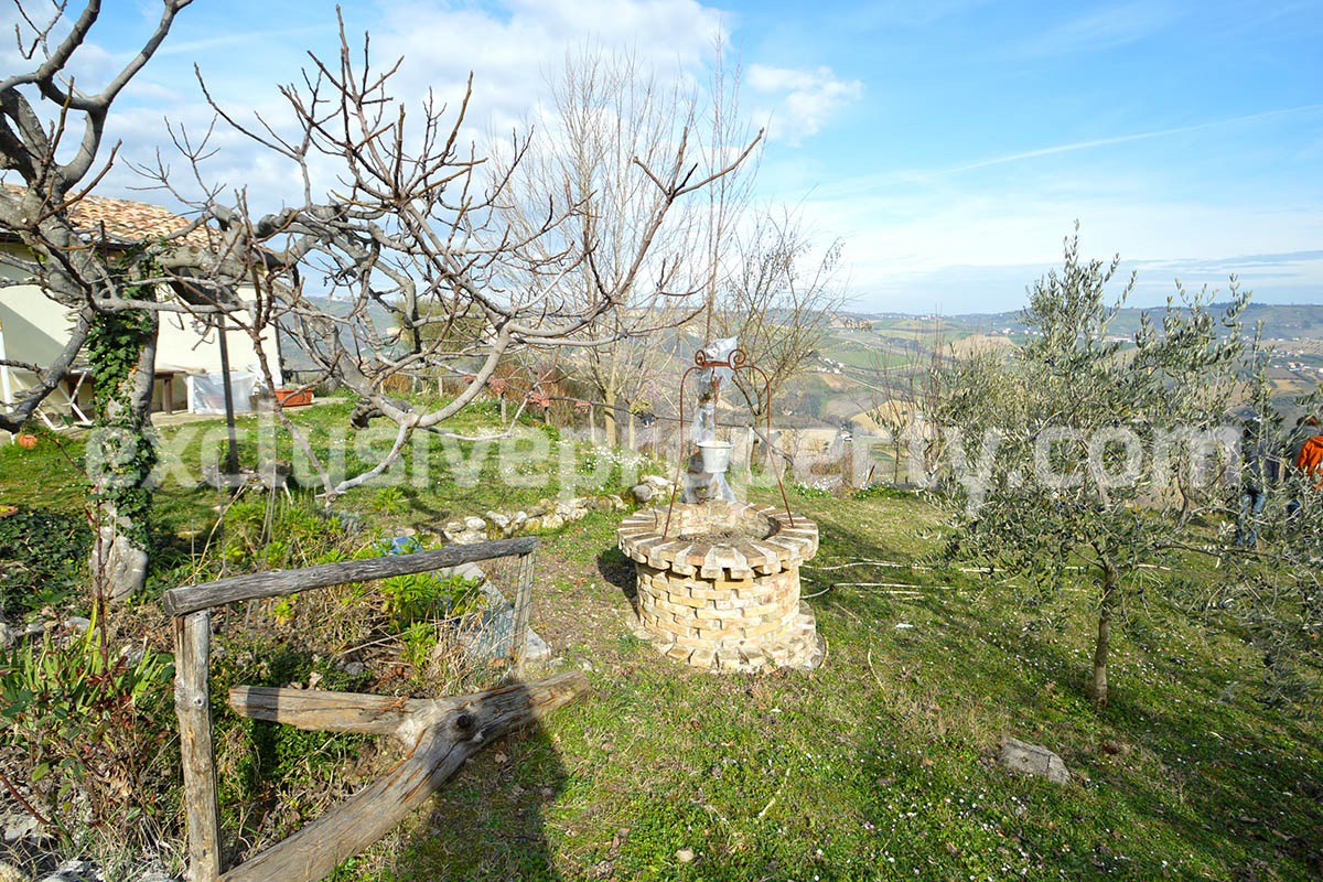 Typical country house back on the green hills near the Adriatic sea