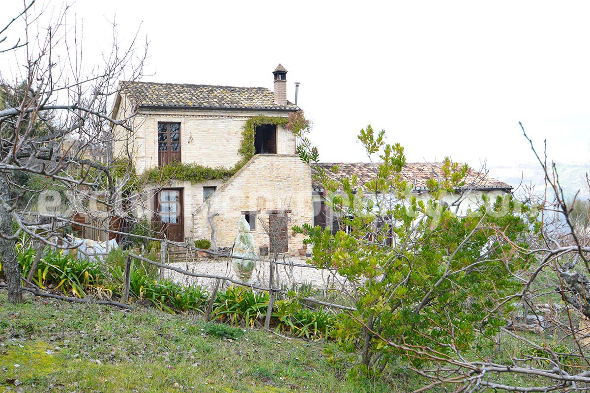 Typical country house back on the green hills near the Adriatic sea 7