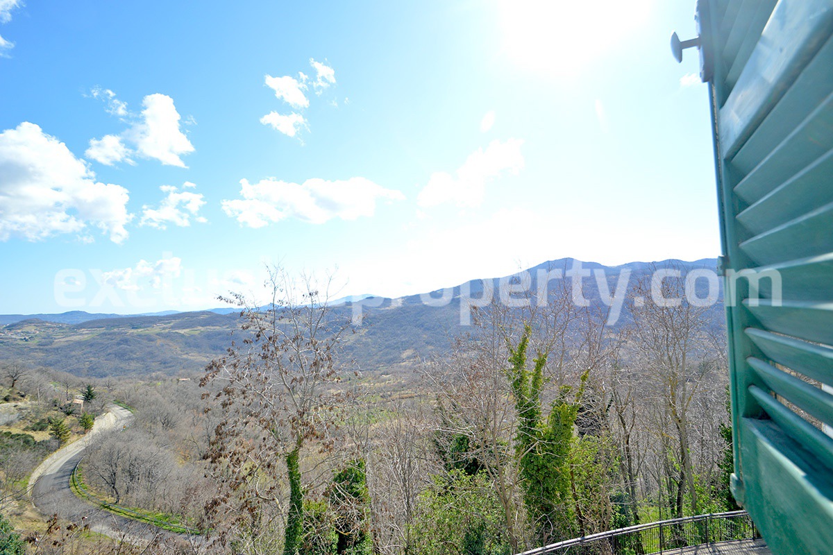 Bright town house with garage and landscape view of the hills for sale in Italy