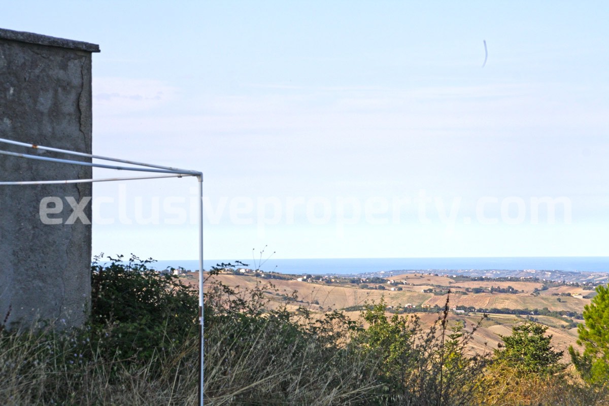 Ruin with two hectares of land with mountain and sea view for sale in Italy