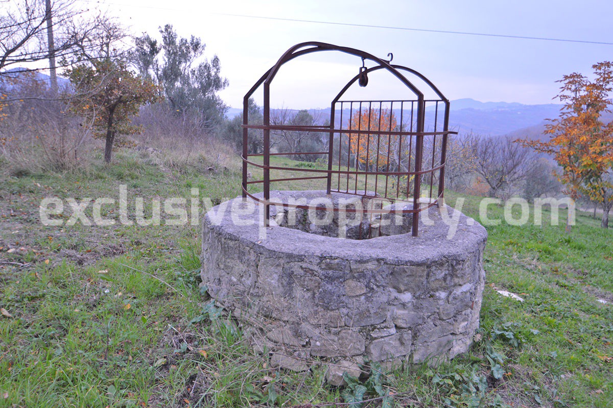 Stone house with well and land for sale in Abruzzo