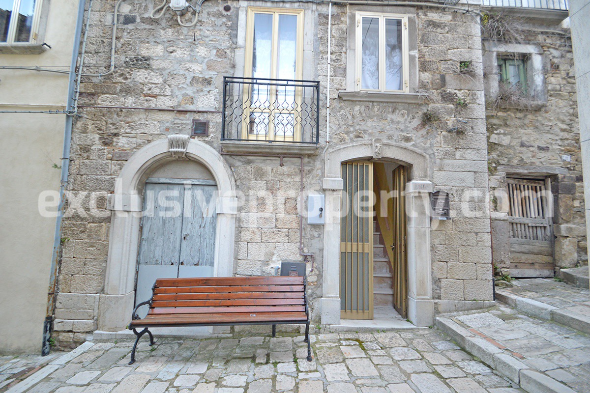 Ancient stone house with antique marble doors for sale near the castle Italy