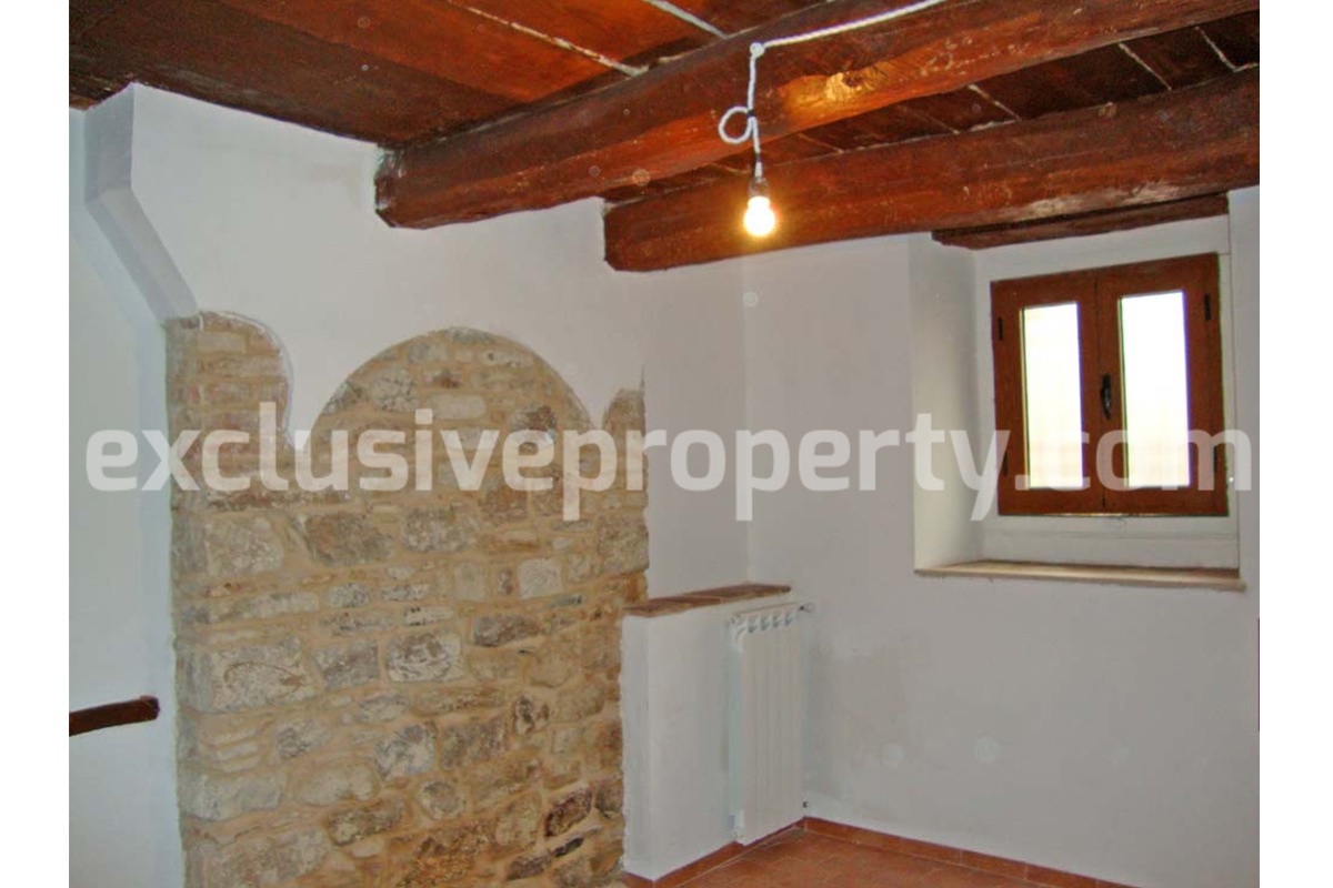 Apartment in restored stone wood loft for sale in Civitacampomarano Molise Italy