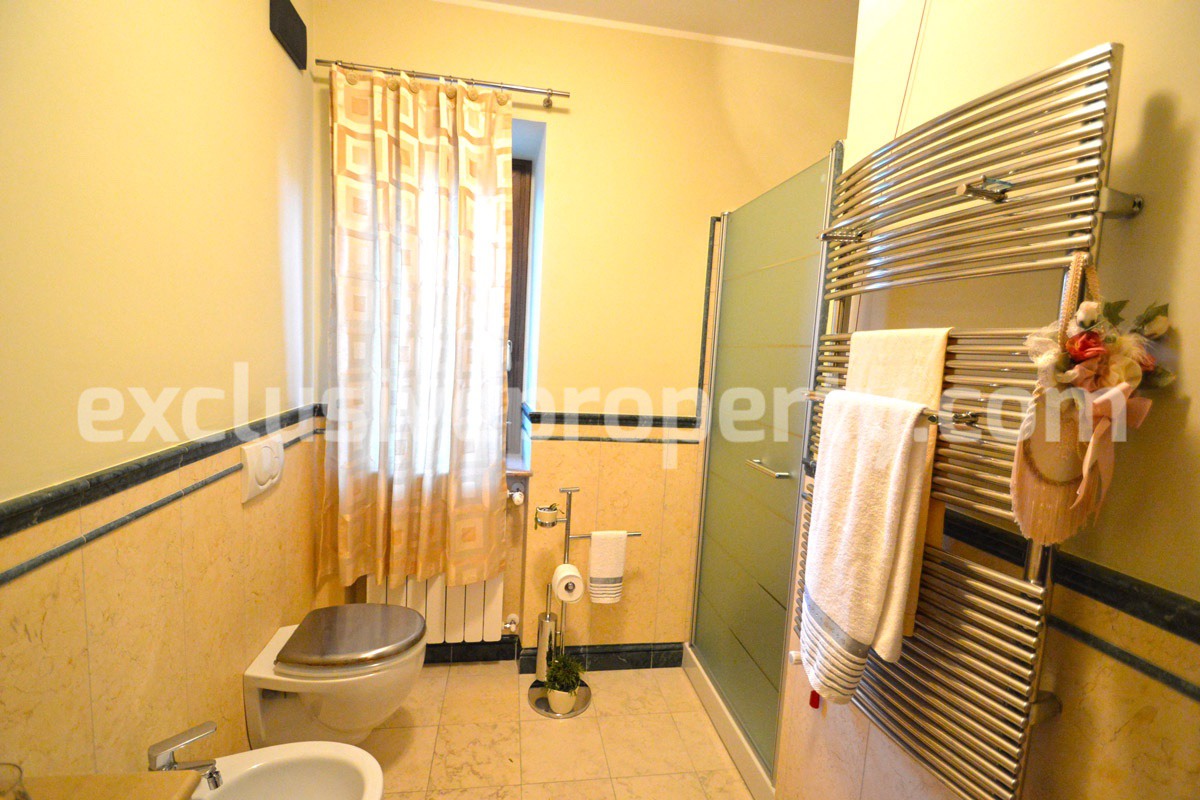 Villa consisting of two apartments with garden for sale in Italy 34