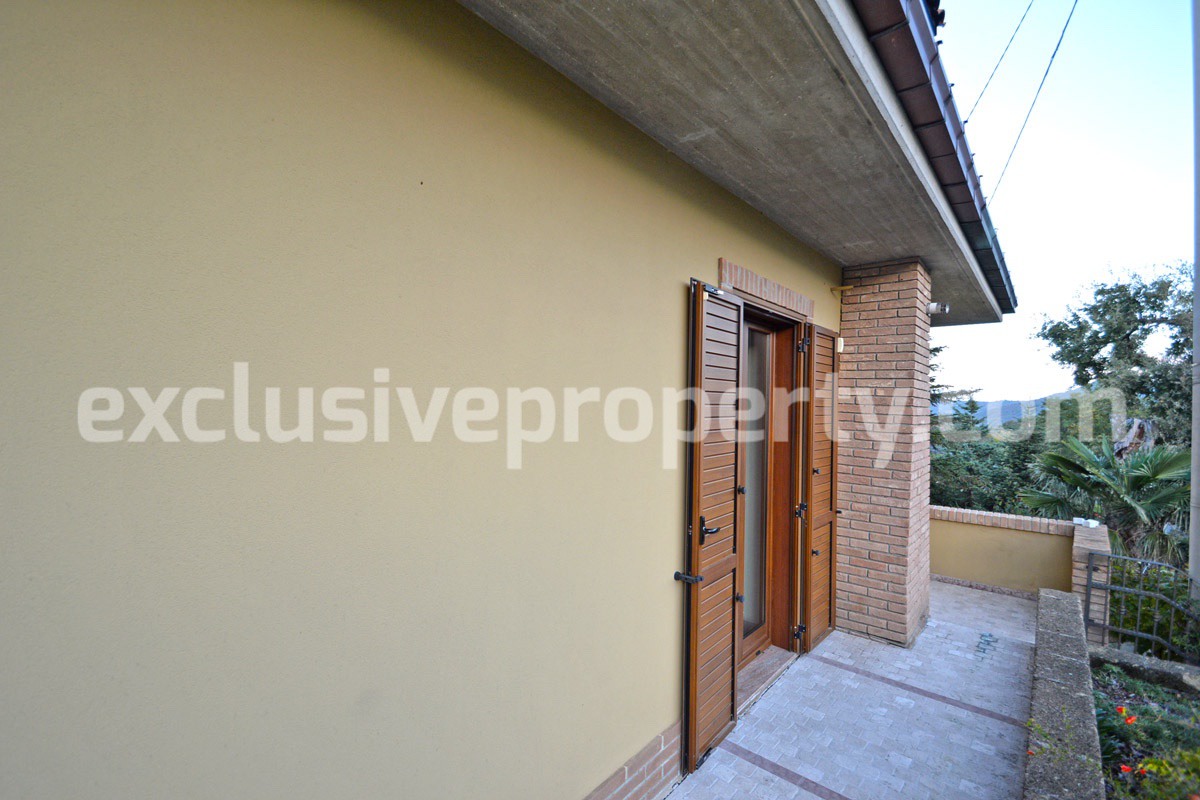 Villa consisting of two apartments with garden for sale in Italy 11