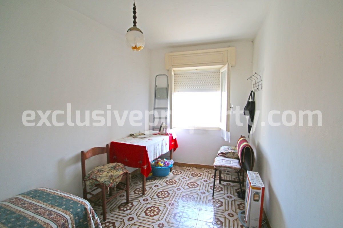 Detached house with two garages and garden for sale in Italy 8