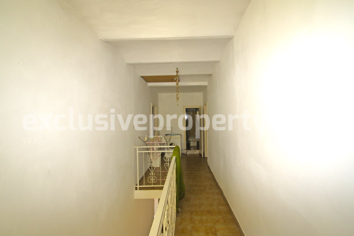 Detached house with two garages and garden for sale in Italy 12