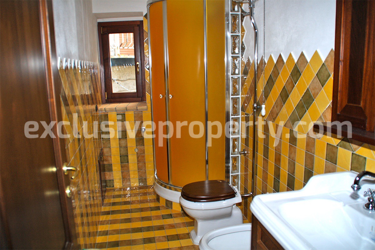 Character stone house partially renovated for sale in Molise 4