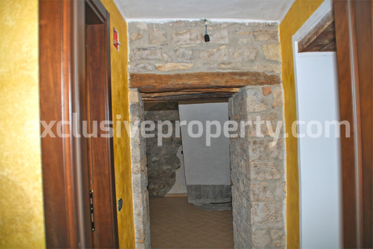 Character stone house partially renovated for sale in Molise 6