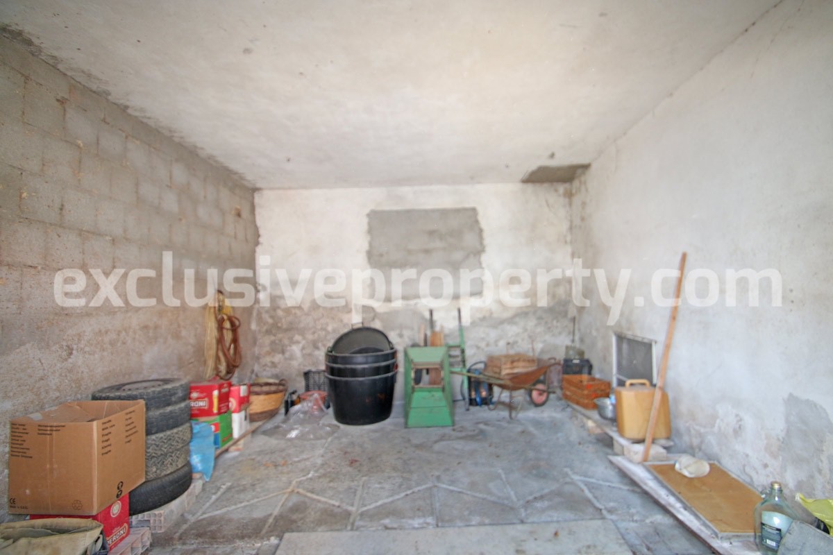 Detached house with two garages and garden for sale in Italy 23