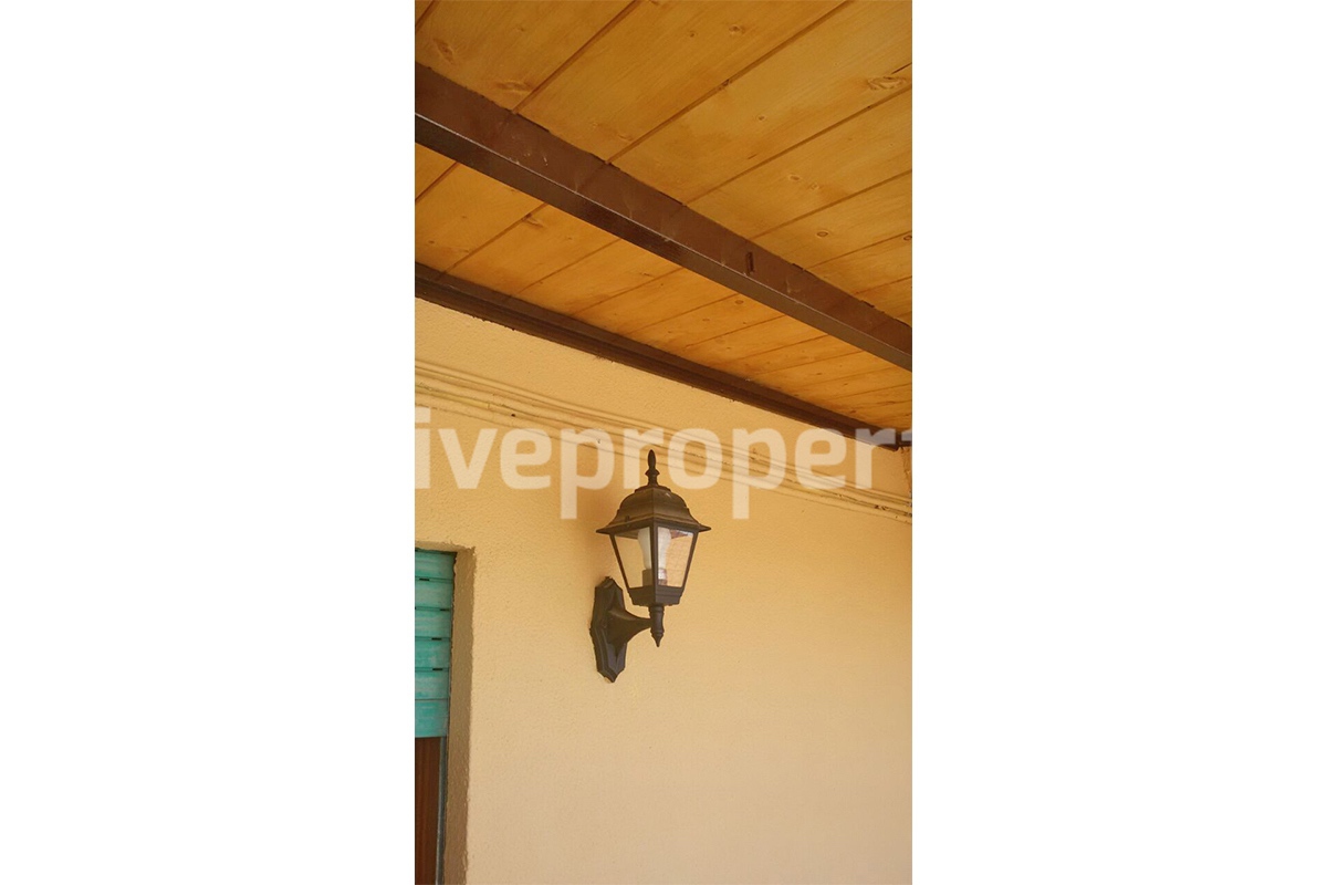 Renovated house with wooden veranda for sale in Italy - Molise