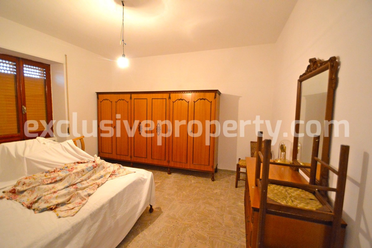 House with a wooden veranda and garage for sale in Abuzzo 15