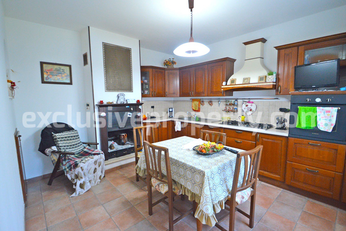 Renovated house with garden and two garages for sale in Italy 19