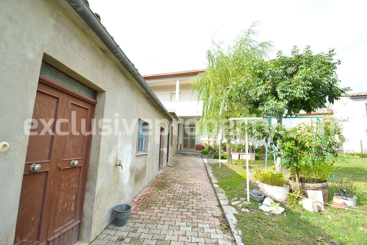 Habitable house with land and outbuildings for sale in Italy 8