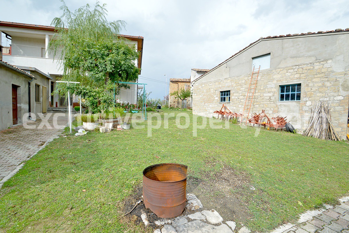 Habitable house with land and outbuildings for sale in Italy 9