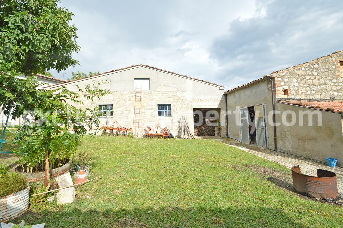 Habitable house with land and outbuildings for sale in Italy 11
