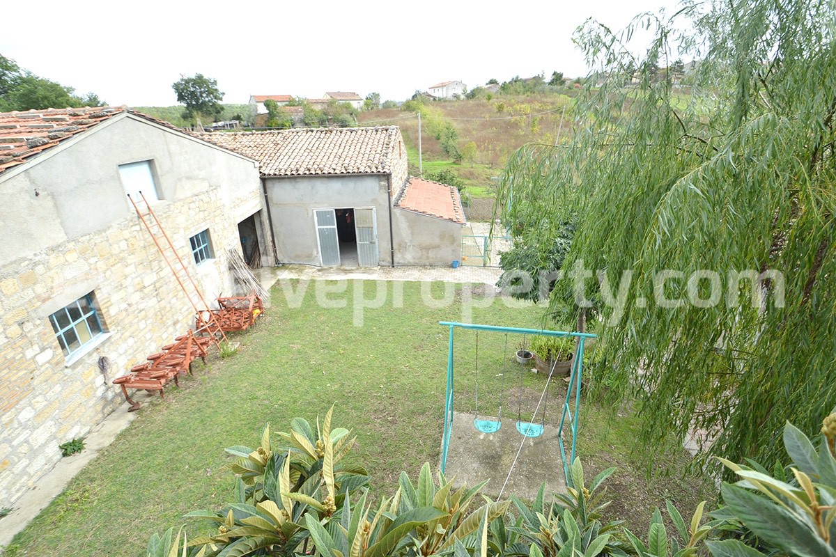 Habitable house with land and outbuildings for sale in Italy 42