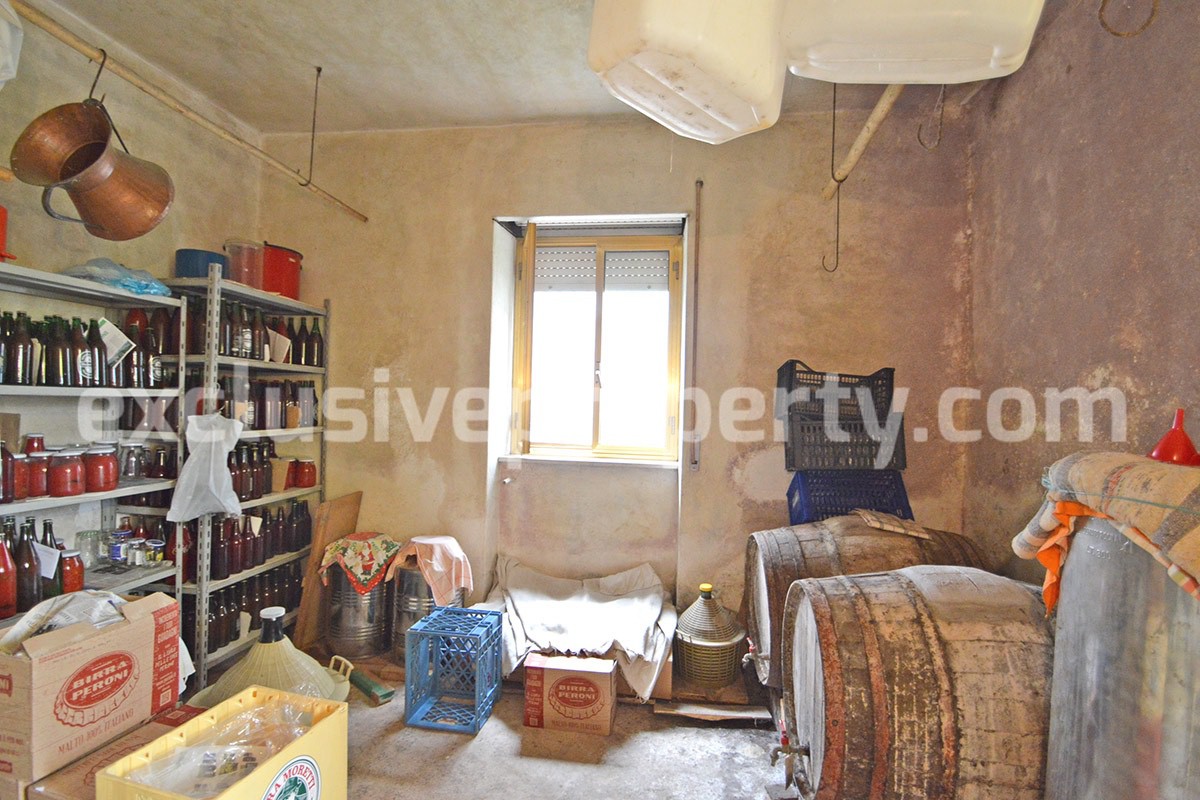 Habitable house with land and outbuildings for sale in Italy 43