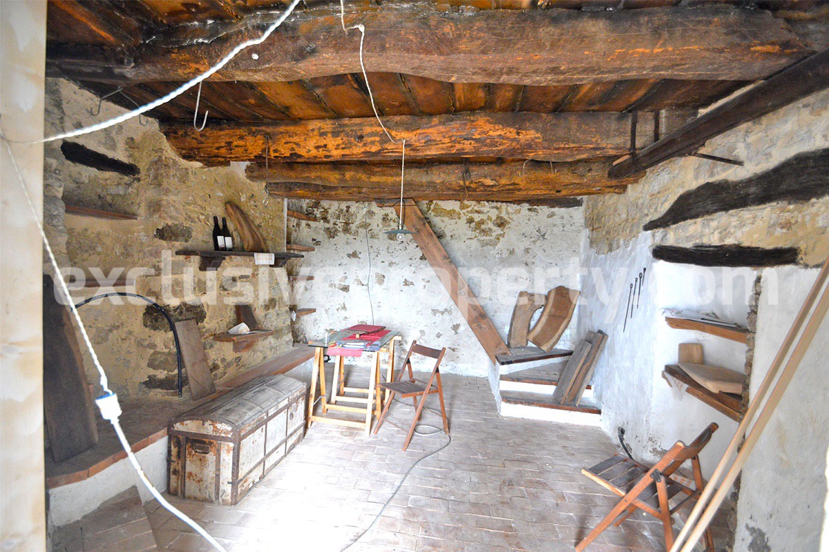 Partially restored stone house with wooden beam ceiling for sale Molise