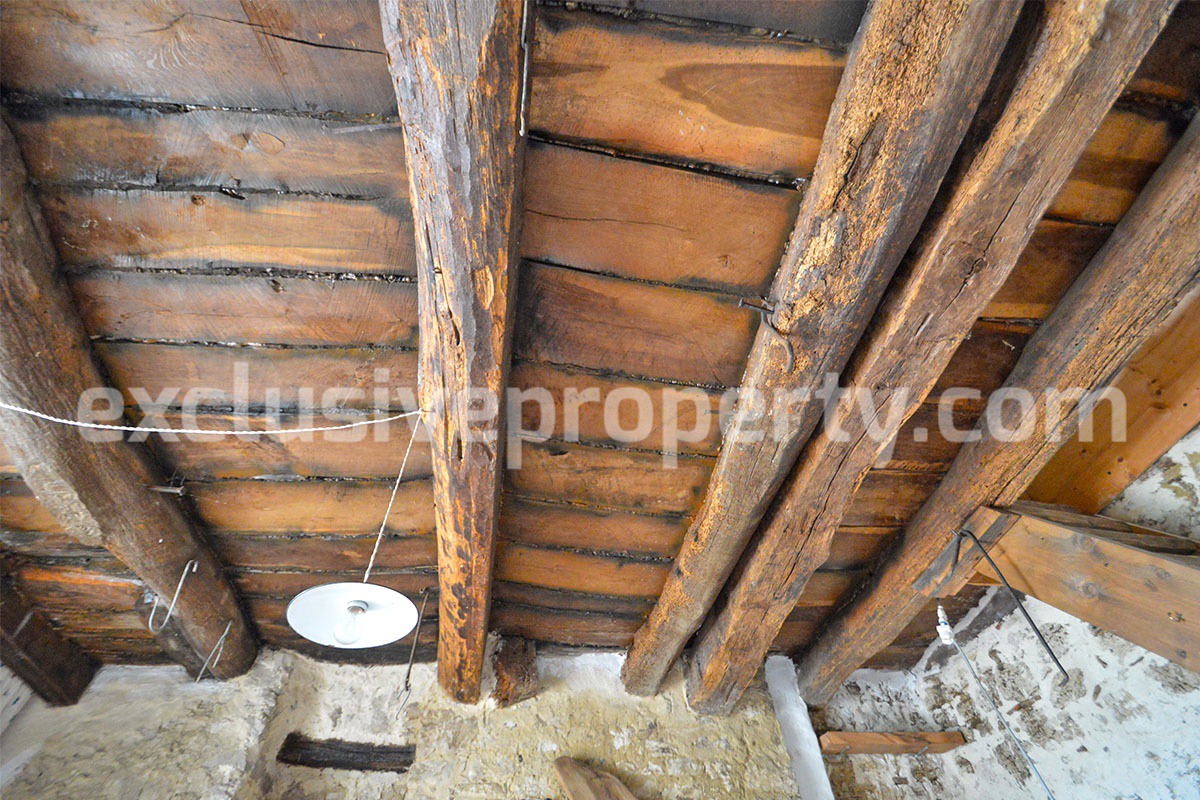 Partially restored stone house with wooden beam ceiling for sale Molise 8