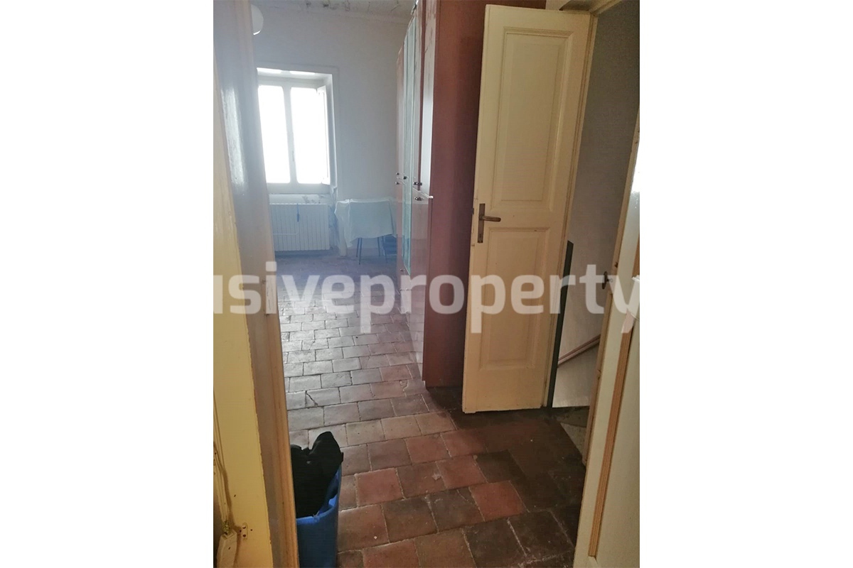 Property with exposed stone facade and marble arches for sale Molise