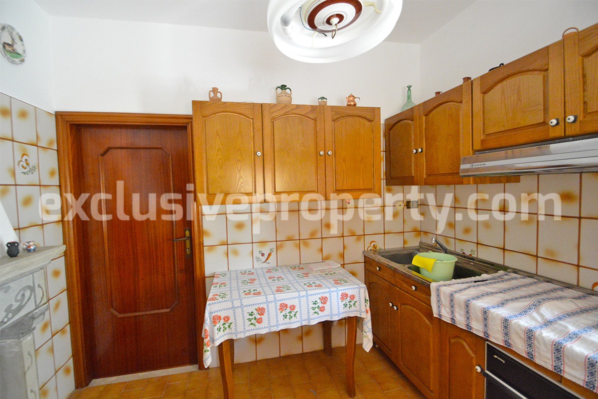 Property in the village habitable with flat land for sale in Italy