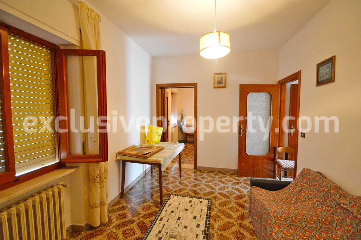 Property in the village habitable with flat land for sale in Italy
