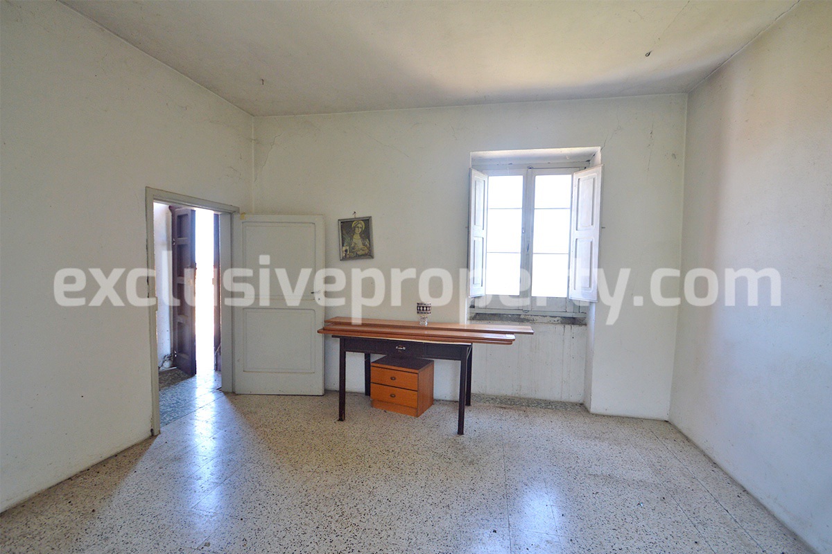 House with fenced flat garden with hillside view for sale in Abruzzo