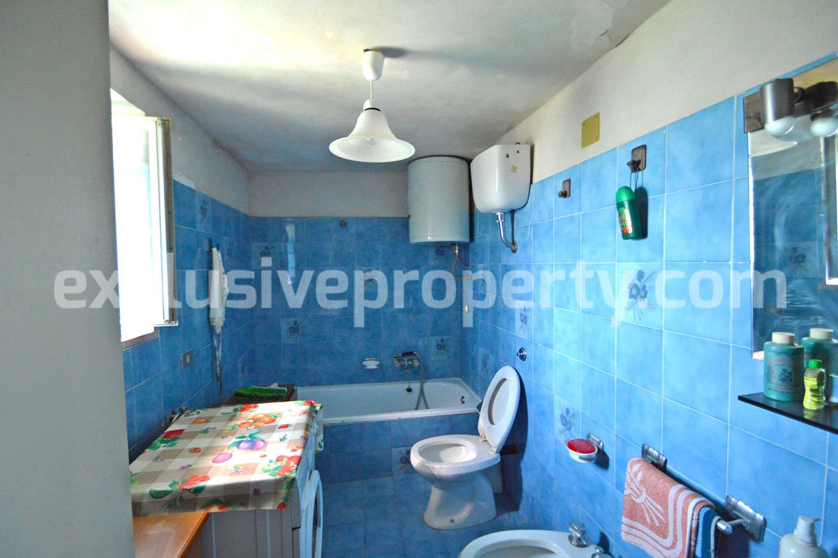 Detached house with land and large terrace valley view for sale in Italy 12