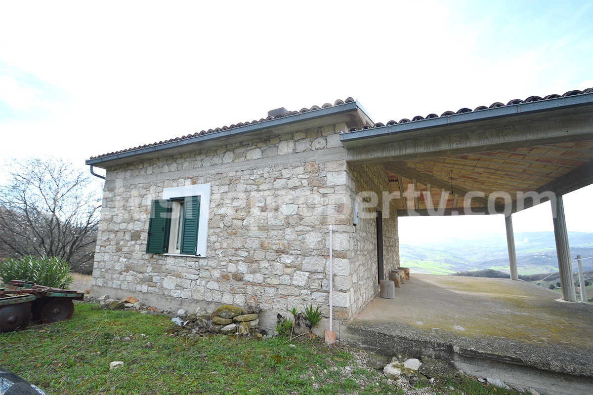 Lovely restored stone country house with land olive trees - veranda and terrace for sale in Italy