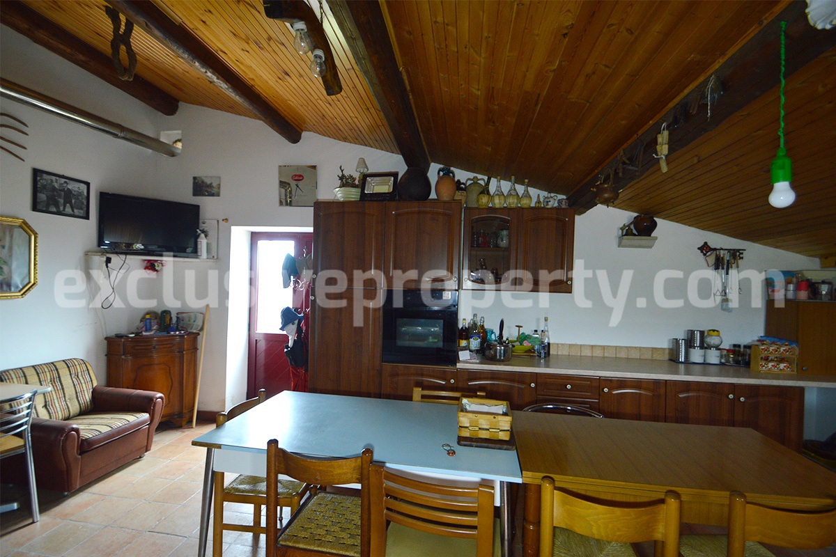 Nice stone country house with land and large wooden veranda for sale in Italy - Molise