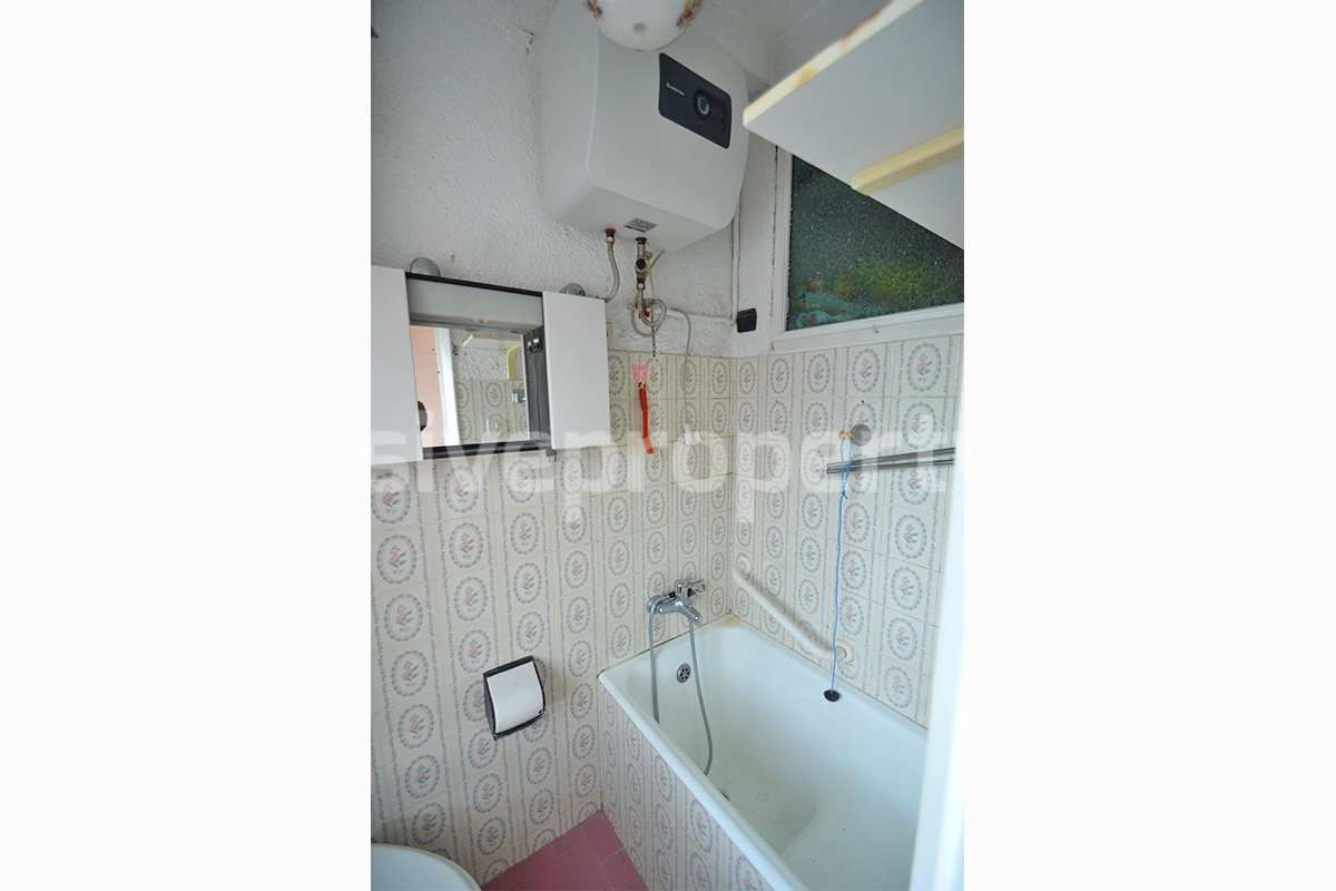 Cheap property for sale - Habitable house with balconies and two bedrooms in Italy