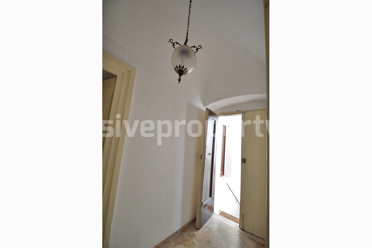 Historic stone house renovated with period details for sale in Molise