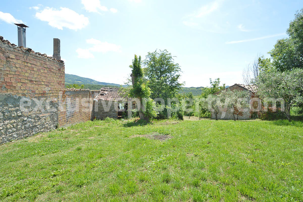 Semi-detached original condition countryside house has a fantastic scenic terrace for sale in Roccaspinalveti