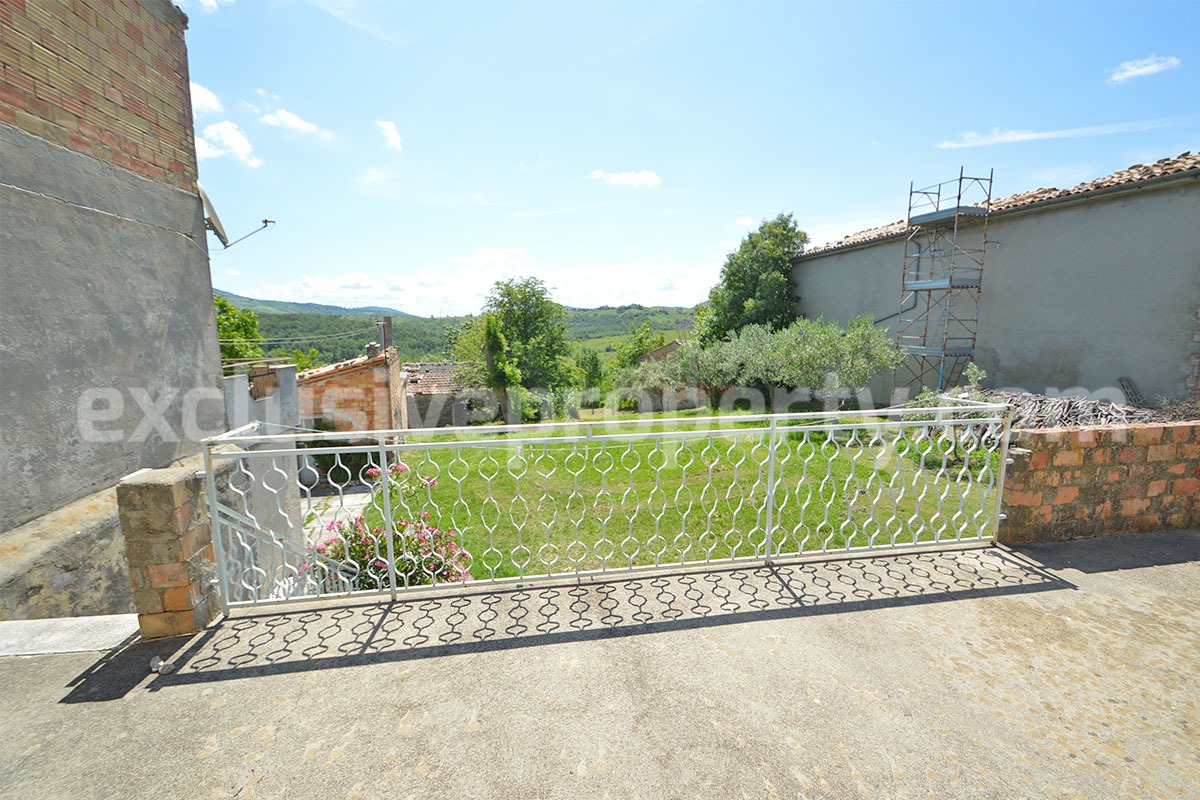 Semi-detached original condition countryside house has a fantastic scenic terrace for sale in Roccaspinalveti