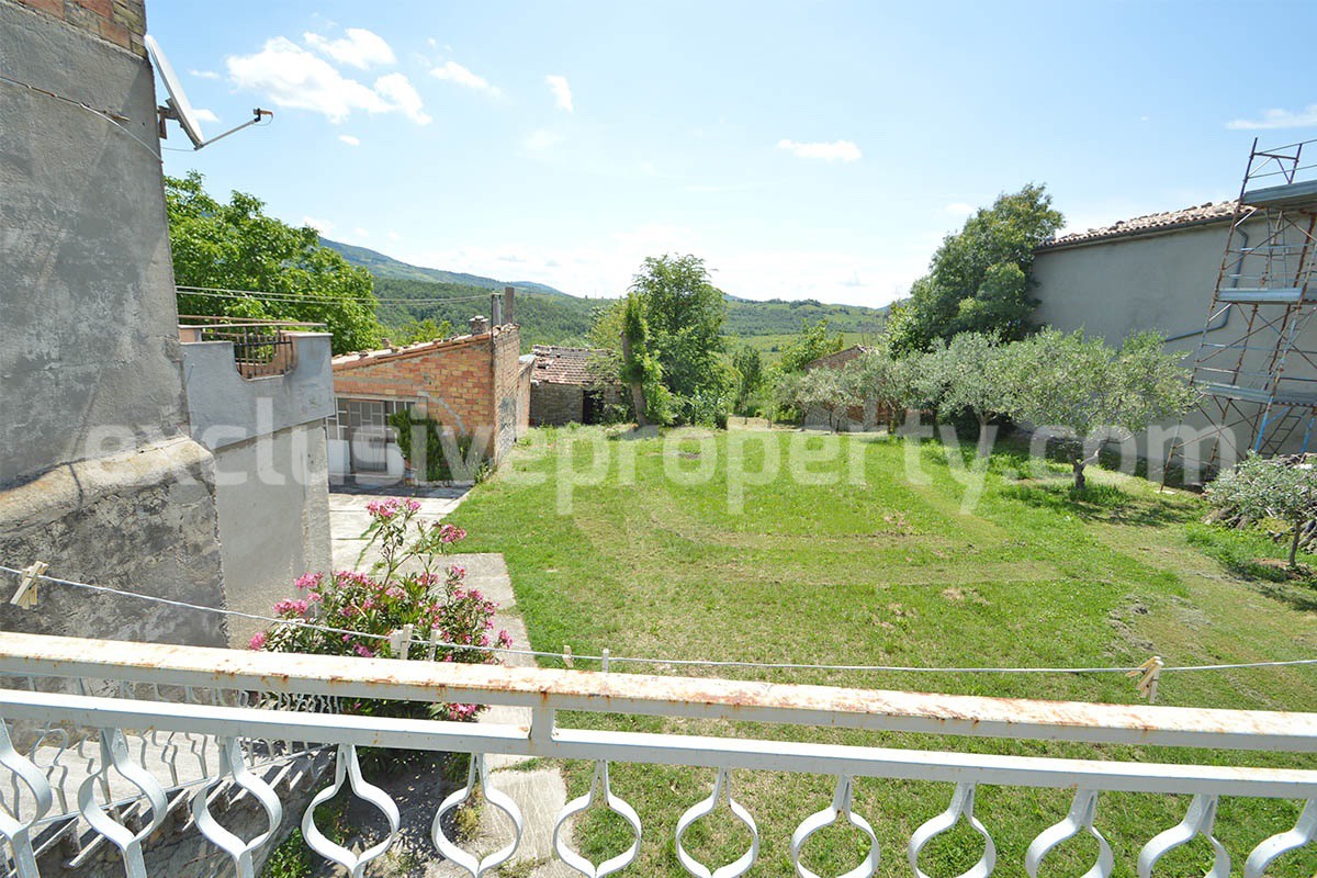 Semi-detached original condition countryside house has a fantastic scenic terrace for sale in Roccaspinalveti