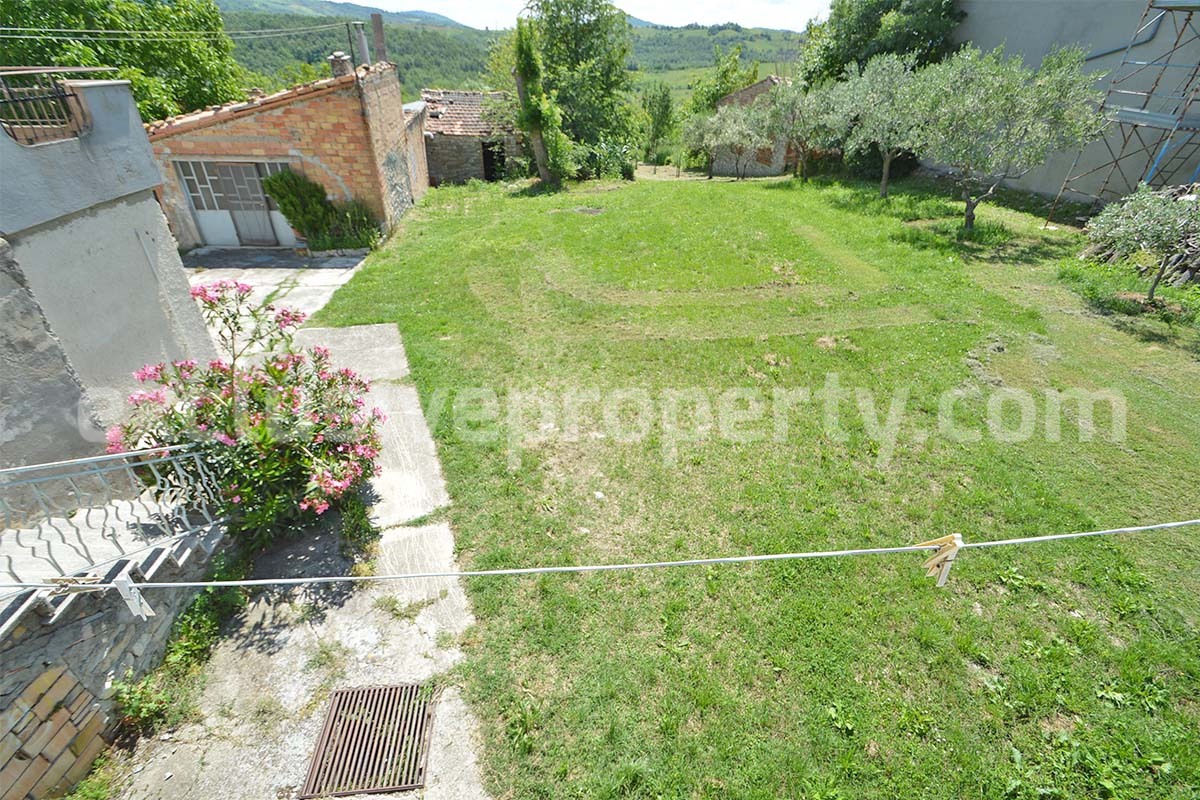 Semi-detached original condition countryside house has a fantastic scenic terrace for sale in Roccaspinalveti