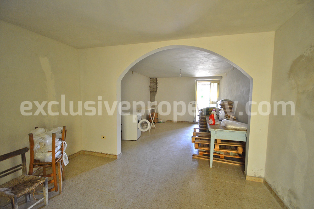 Semi-detached original condition countryside house has a fantastic scenic terrace for sale in Roccaspinalveti