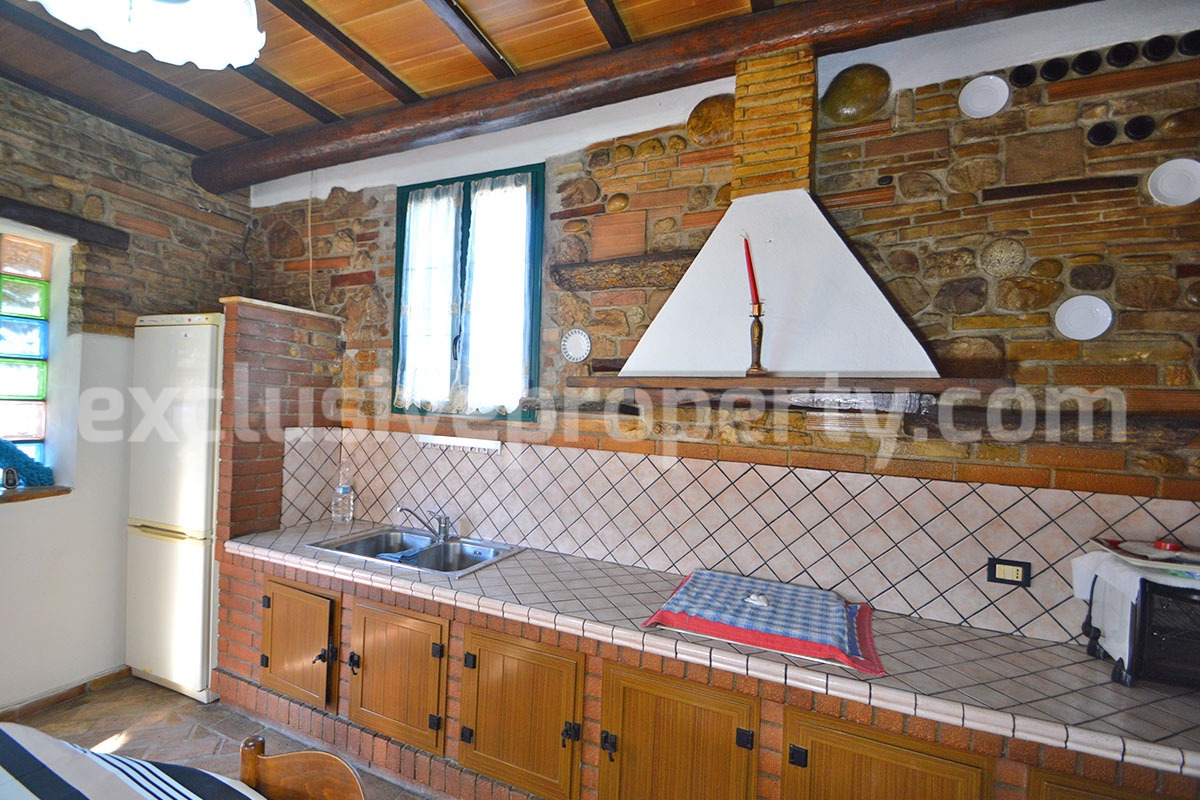 Rustic Country House with Wooden Veranda - Mountain and Hill Views - Garage and Garden in Molise - For Sale in Italy