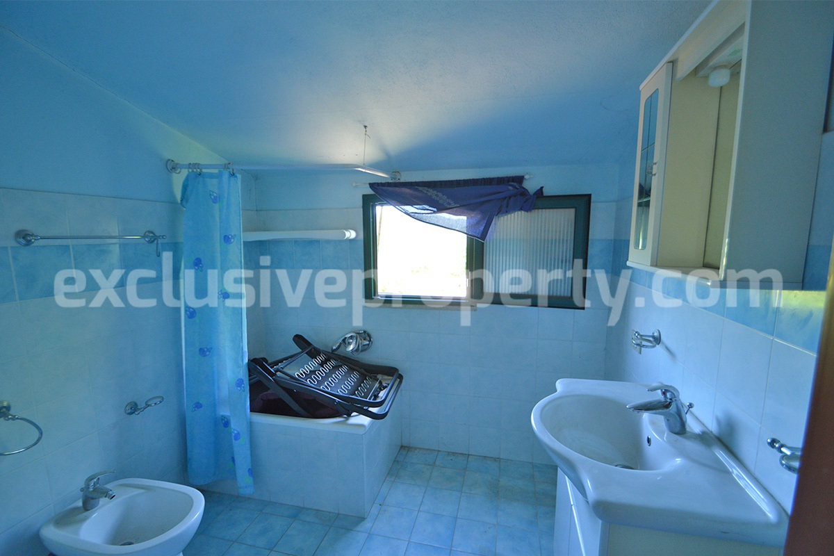 Stone House with Terrace and Brick Exterior for Sale in Central Italy Abruzzo - Great Potential and Scenic View