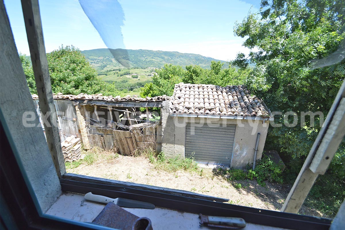 Stone House with Terrace and Brick Exterior for Sale in Central Italy Abruzzo - Great Potential and Scenic View