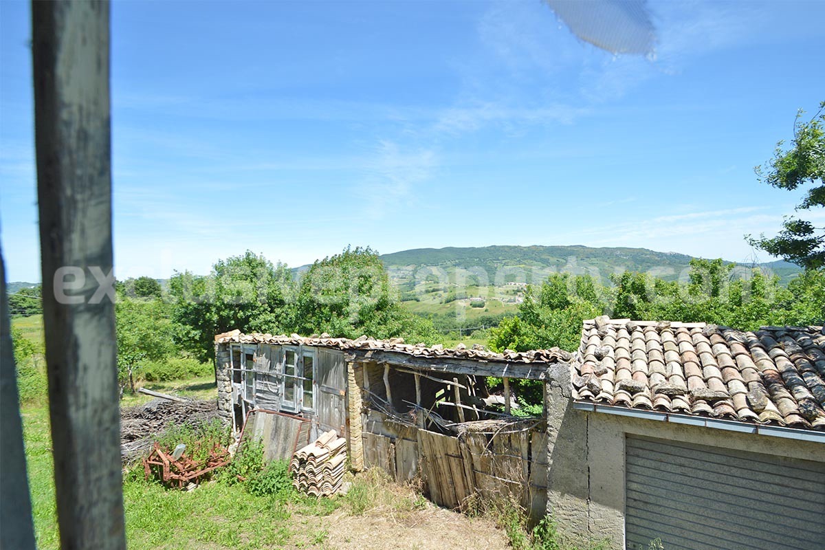 Stone House with Terrace and Brick Exterior for Sale in Central Italy Abruzzo - Great Potential and Scenic View