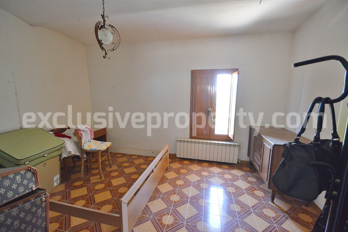 Stone House with Terrace and Brick Exterior for Sale in Central Italy Abruzzo - Great Potential and Scenic View
