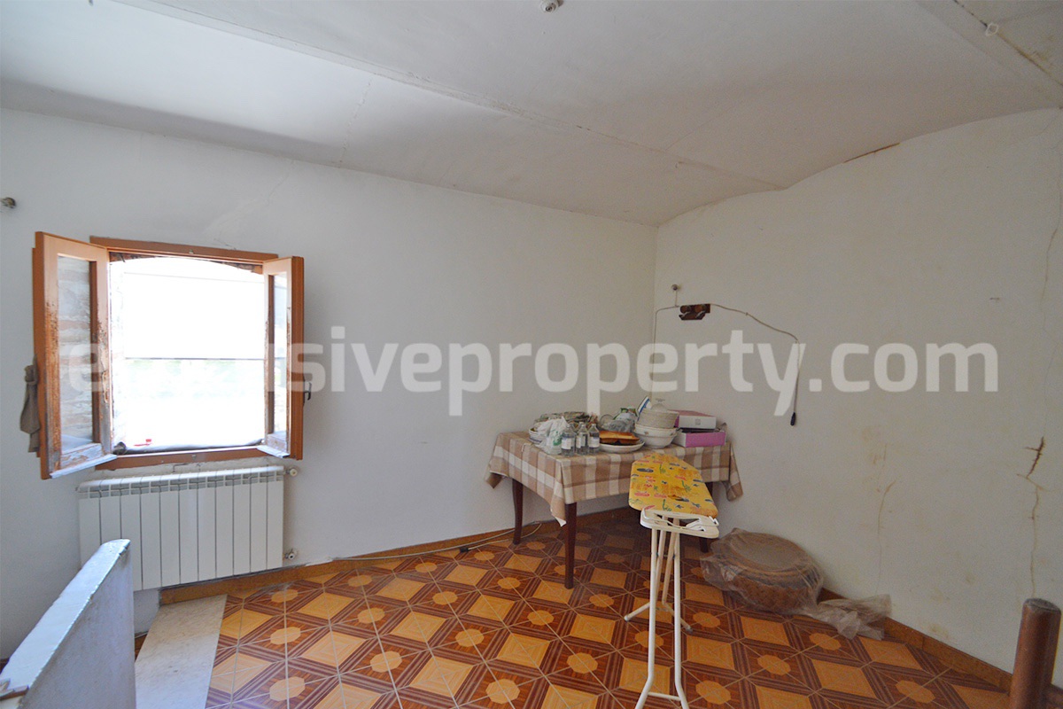 Stone House with Terrace and Brick Exterior for Sale in Central Italy Abruzzo - Great Potential and Scenic View