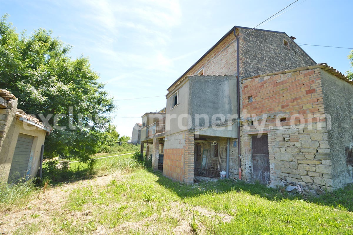Stone House with Terrace and Brick Exterior for Sale in Central Italy Abruzzo - Great Potential and Scenic View