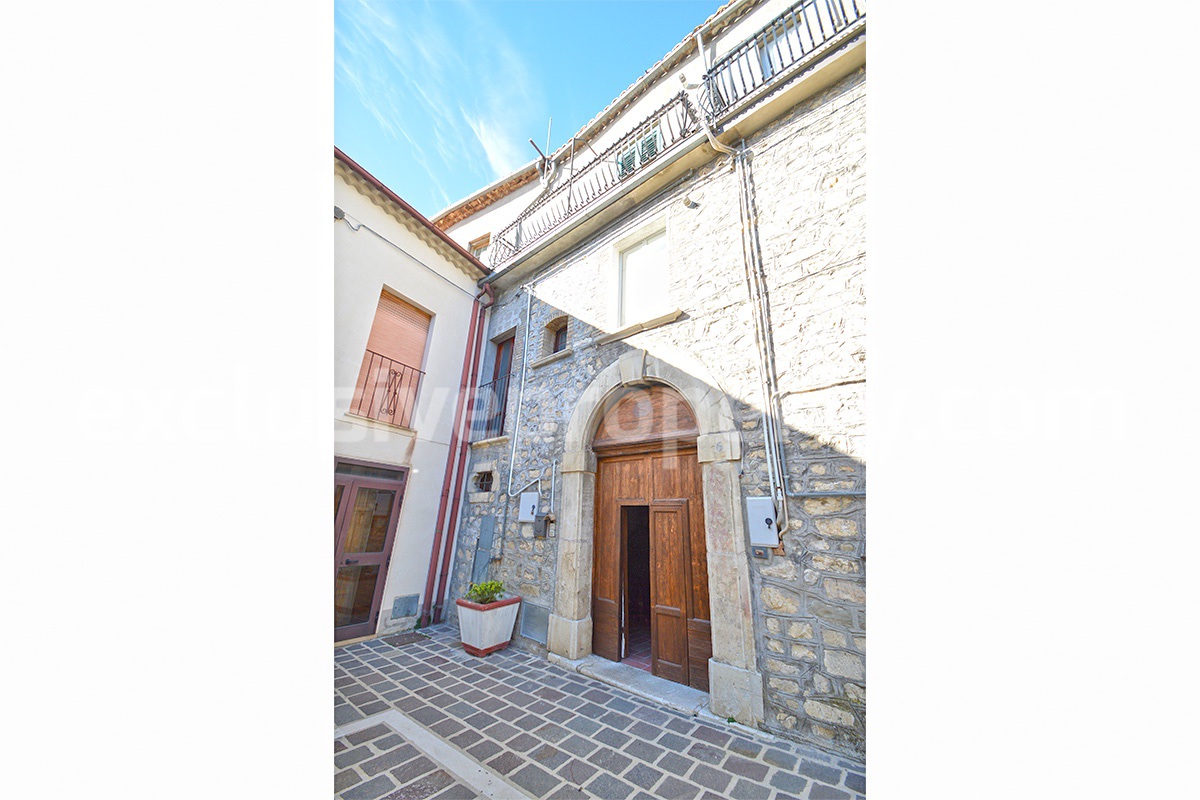 Stone Apartment for Sale in Abruzzo - Renovated Home with Balcony - Views and Historic Marble Portal