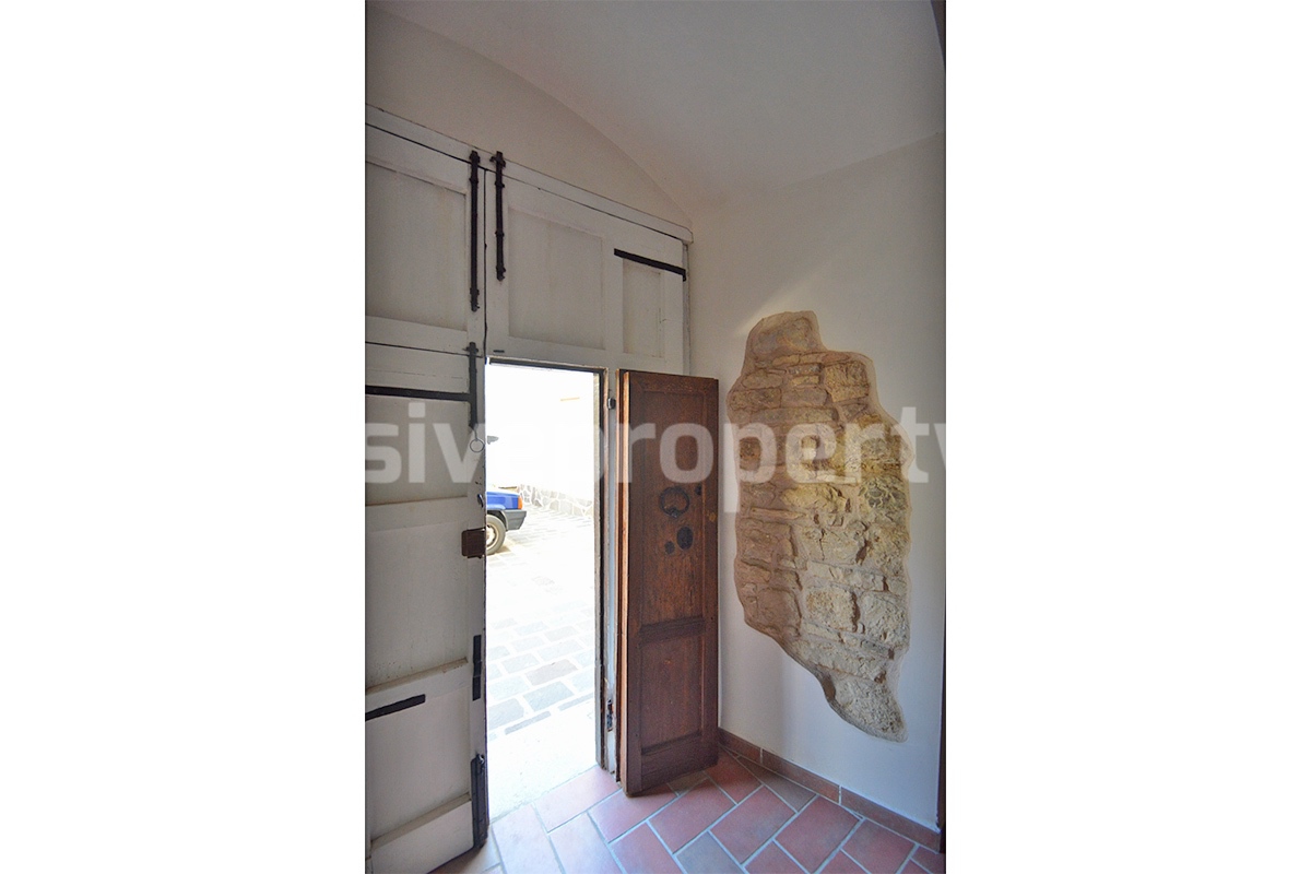 Stone Apartment for Sale in Abruzzo - Renovated Home with Balcony - Views and Historic Marble Portal